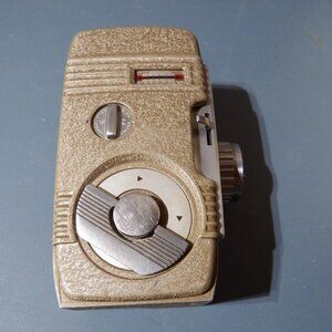 Vintage Revere 8 mm movie camera and light attachment